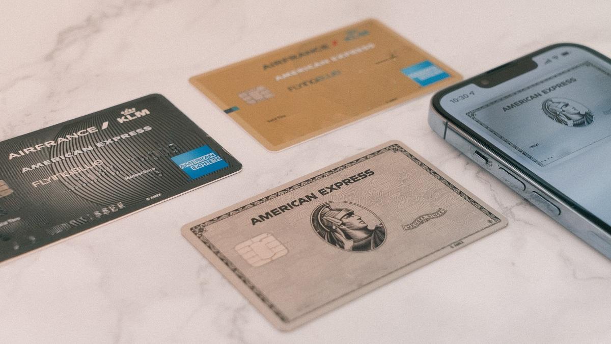 Amex cards on white table