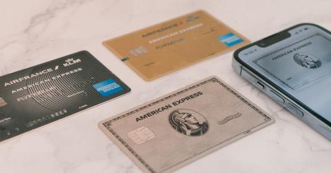 Amex cards on white table