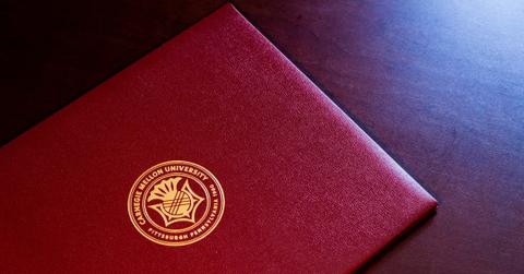 Maroon Carnegie Mellon diploma holder