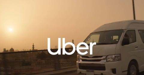An uber graphic of a van at sunset