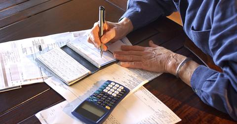 Person writing a check