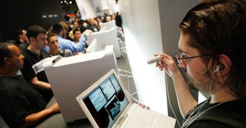 A person using a laptop at a tech event