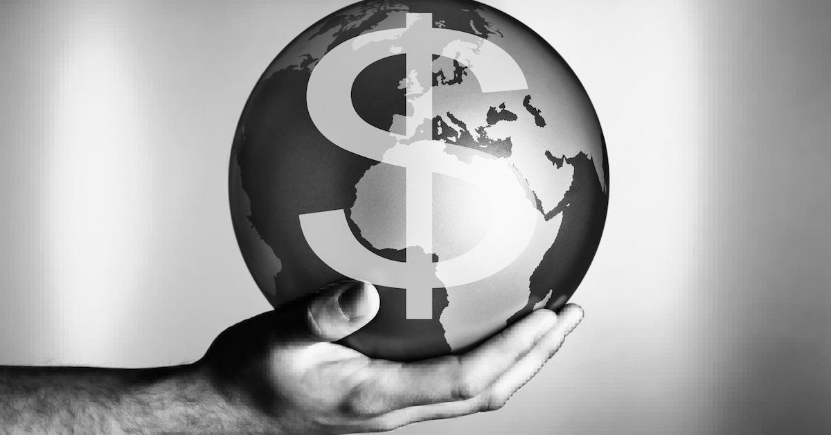 Man holding globe stock photo