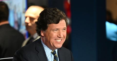 Tucker Carlson smiling at the FOX Nation Patriot Awards in November 2022