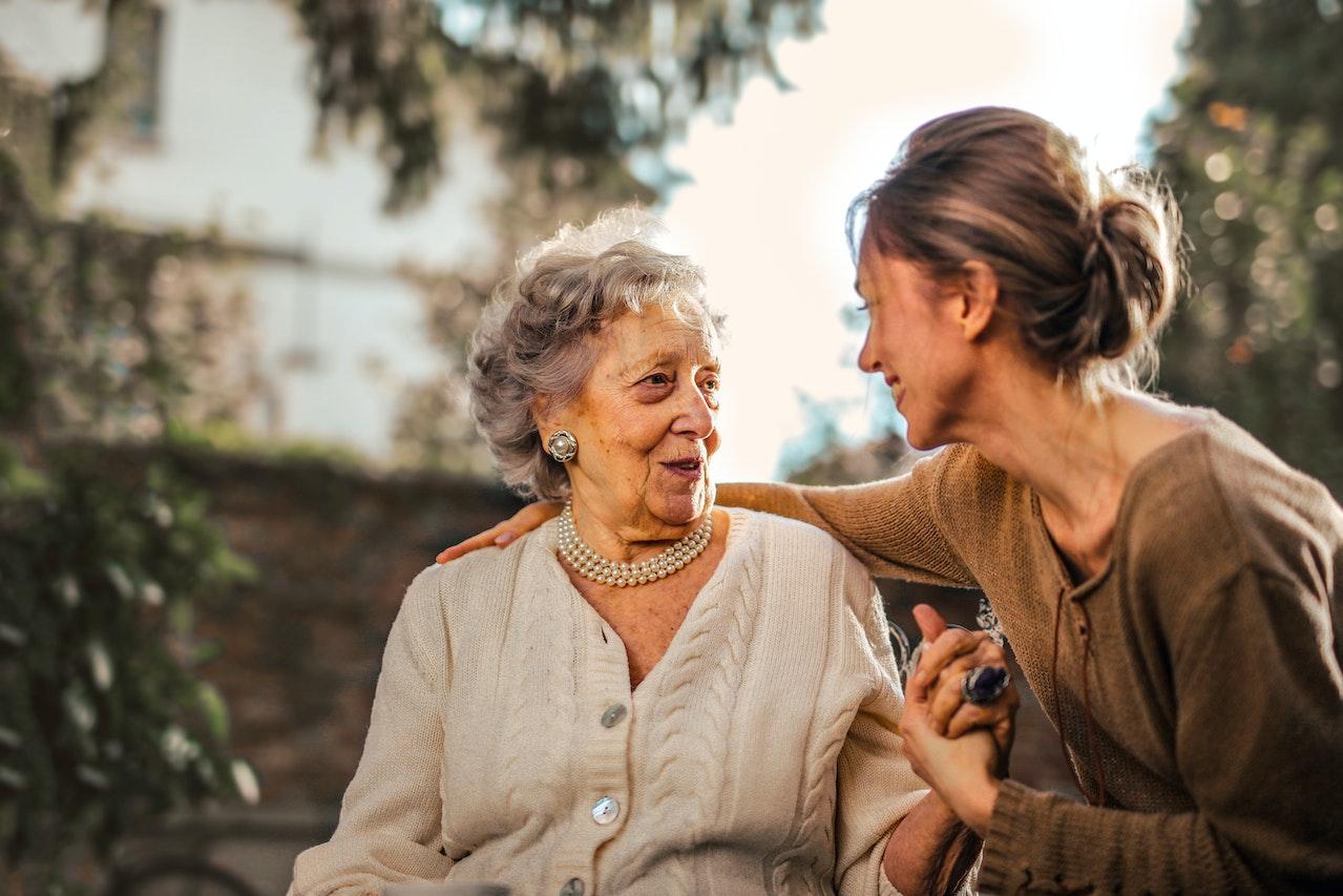 Mother and daughter in a garden