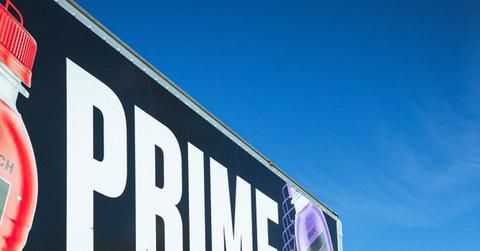 KSI and Logan Paul next to a Prime truck