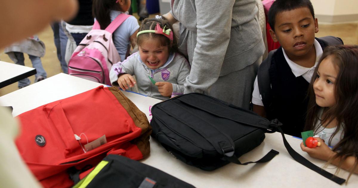 Kids getting free bags from one-for-one companies