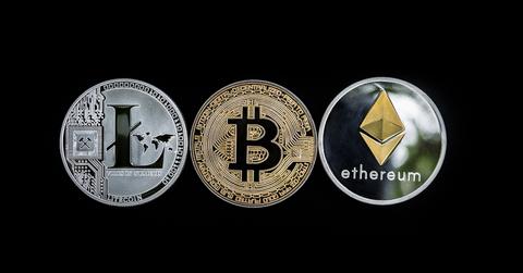 Bitcoin, Litecoin, and Ethereum coins