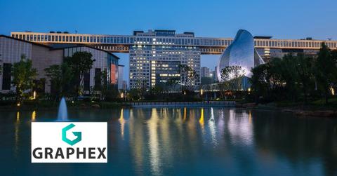 Graphex logo over a lake and building
