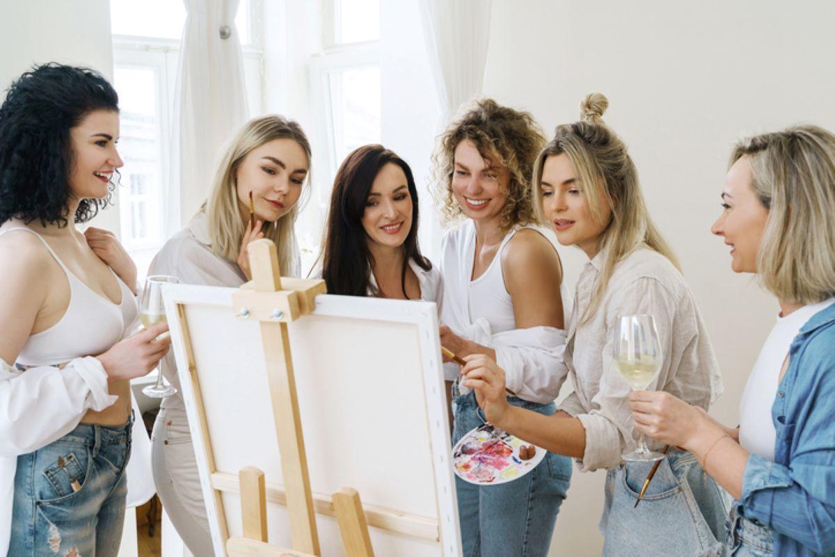 bridesmaids painting a picture