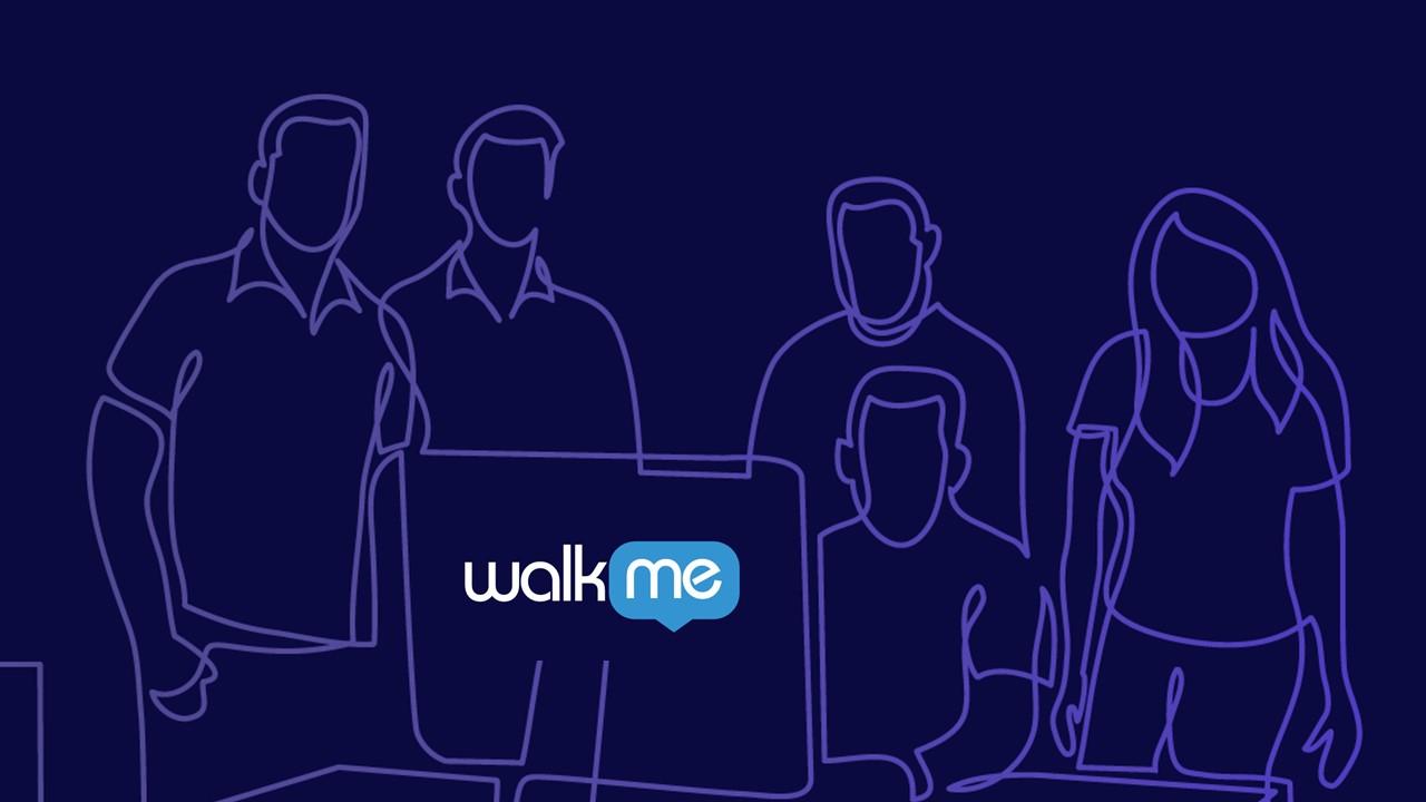 People standing around a computer and WalkMe logo