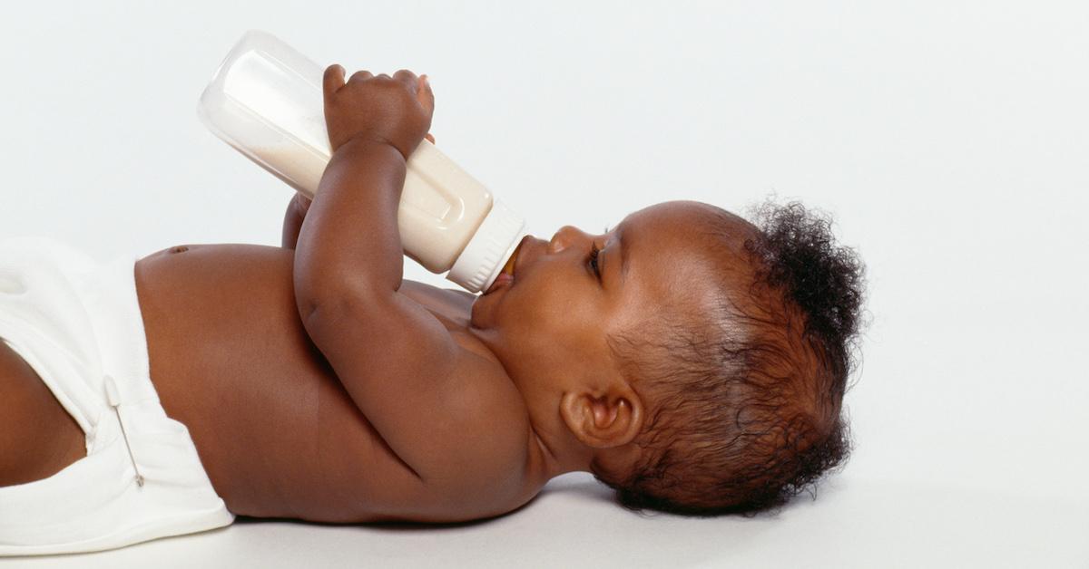 Baby drinking a bottle of formula