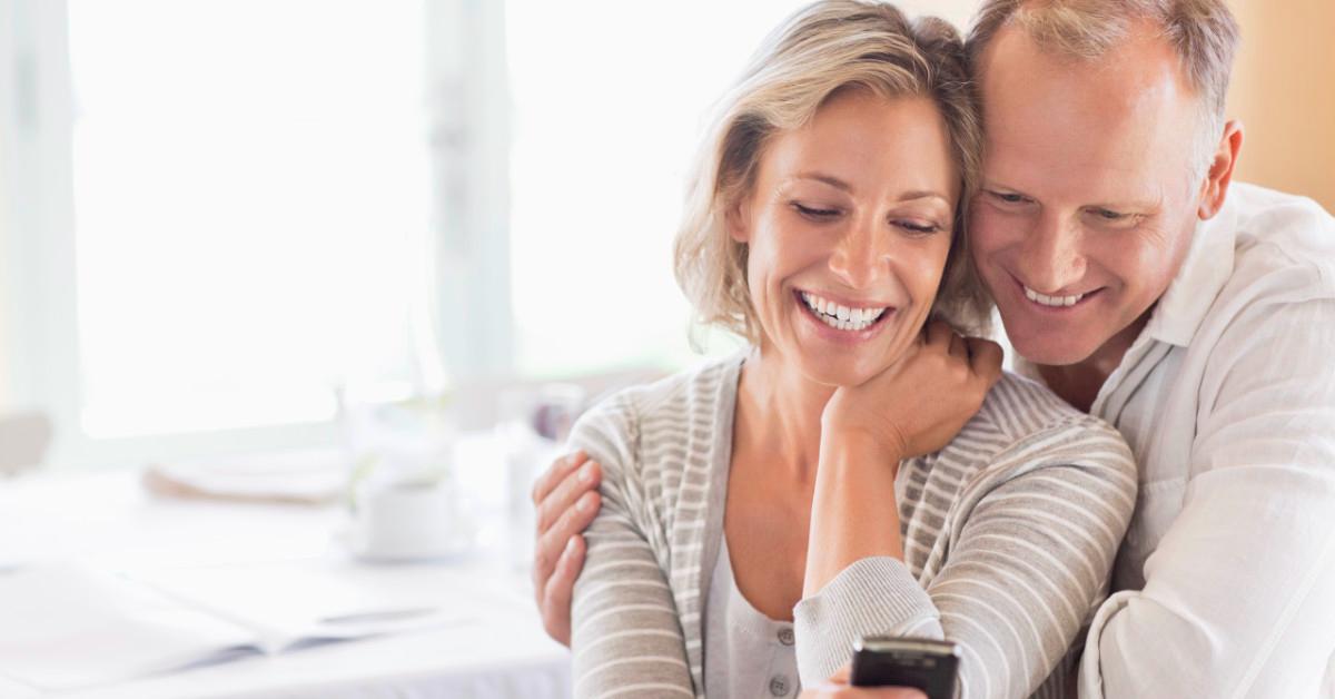 Couple using cell phone