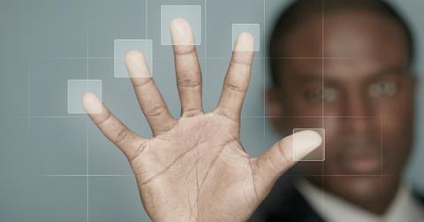 A man holding up his hand