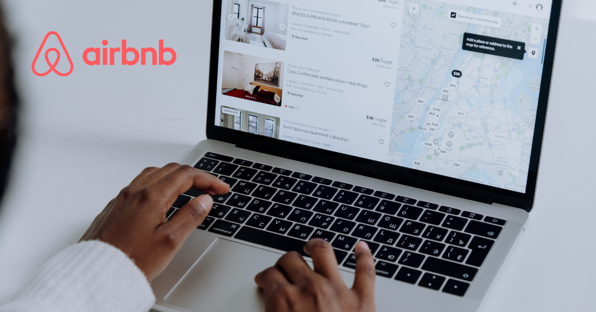 A person using Airbnb's website on a laptop and the Airbnb logo