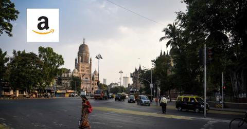 amazon logo over image of mumbai india