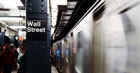 Wall Street sign in NYC subway station