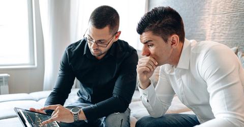 Men discussing crypto scams