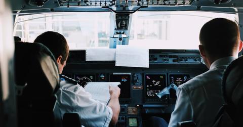 Two pilots in an airplane cockpit