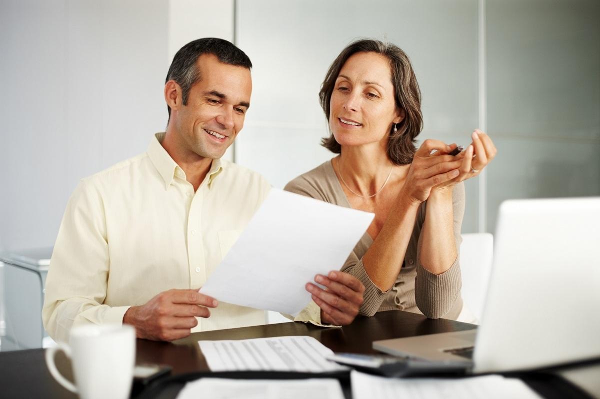 Couple working on financial expenses