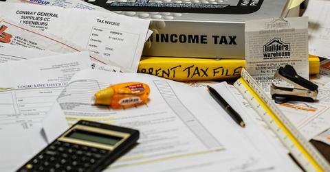 Income tax papers and calculator