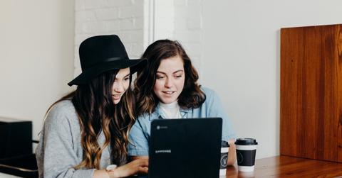 Two teen girls on computer