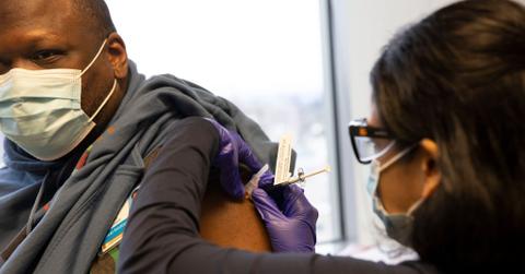 A man getting a COVID-19 vaccine