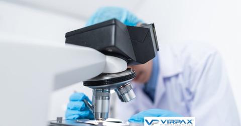 A scientist using a microscope