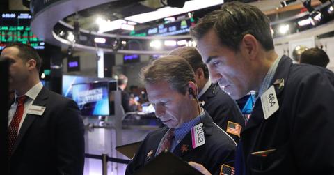 Stock traders discussing stock picks