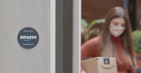 Person picking package from Amazon