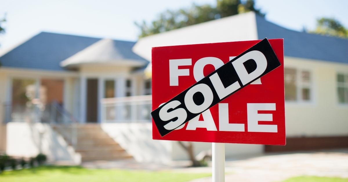 Sold sign in front of a house