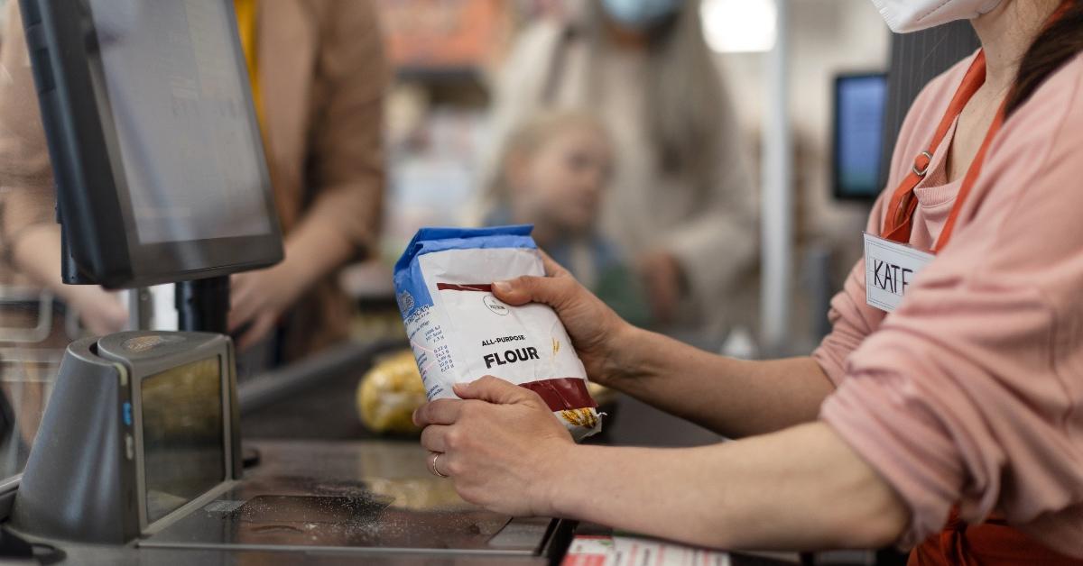 cashier ringing up flour