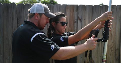 Zillow employees inspecting a home
