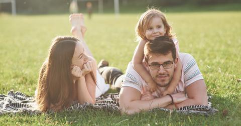 A couple with their adopted daughter