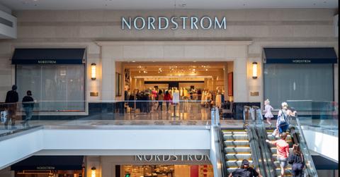 Shoppers walk into a Nordstrom department store at the Barton Creek Square shopping center.