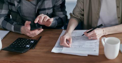 A couple calculating tax credits