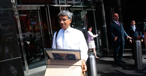 A man leaving an office after getting laid off