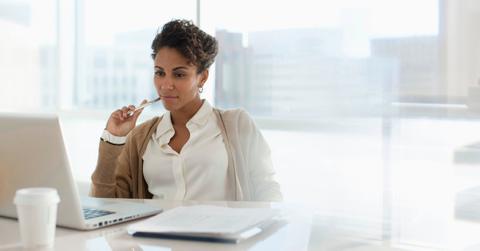 Woman looking at computer