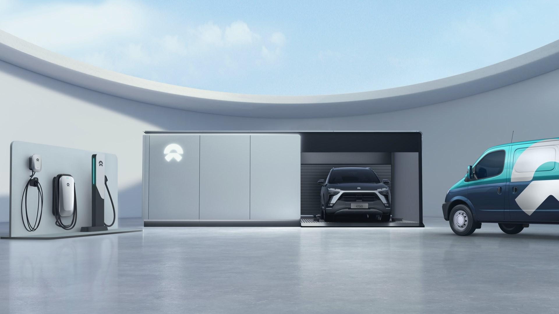 NIO vehicles and a charging station