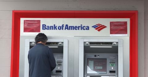 A person using a Bank of America ATM
