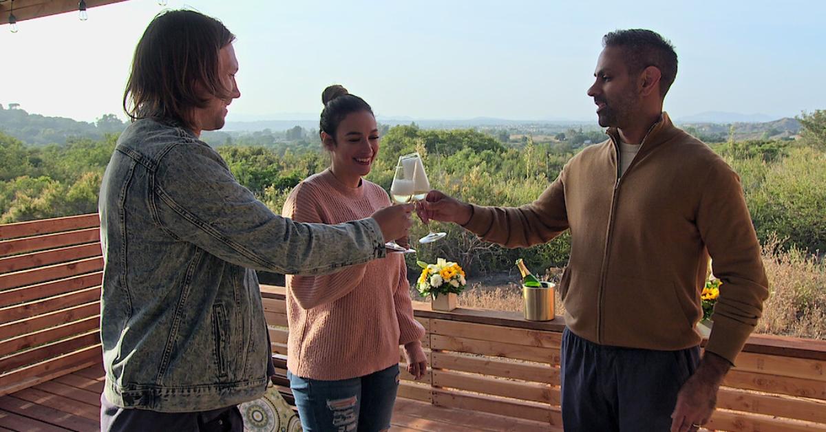 Financial expert Ramit Sethi in a toast with clients Matt and Amani. 