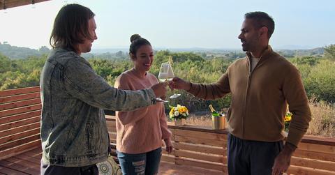 Financial expert Ramit Sethi in a toast with clients Matt and Amani.