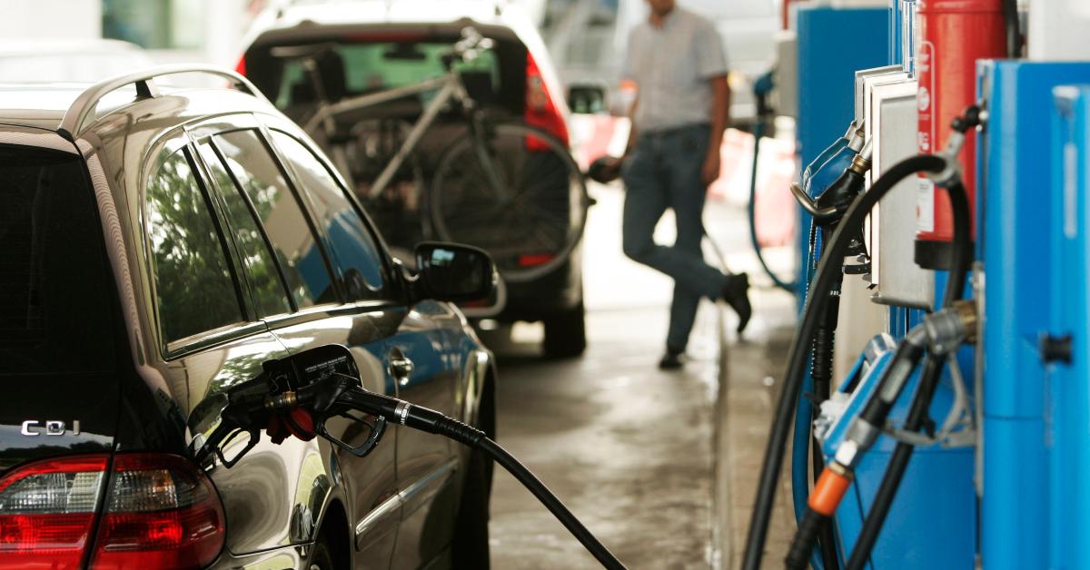 People at a gas station