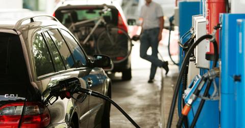 People at a gas station