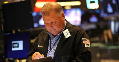 A stock trader looking at data