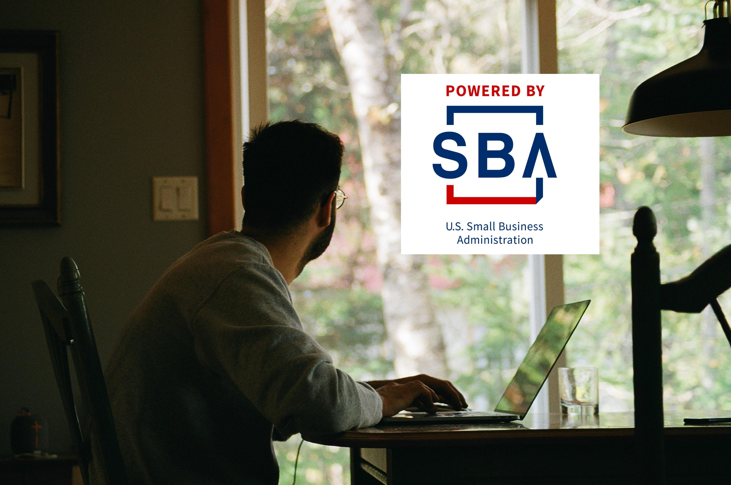 SBA logo over independent contractor working from home