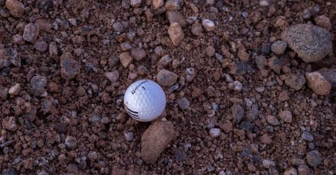 A golf ball on the ground