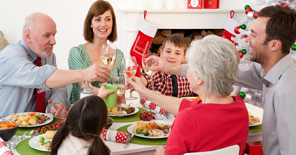 A family eating a meal at Christmas