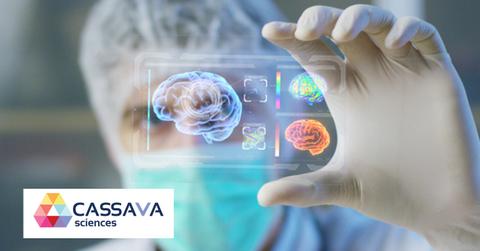 Cassava Sciences logo over scientist wearing scrubs