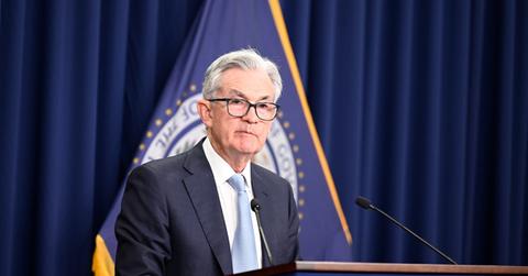 Fed Chair Jerome Powell announcing a rate hike